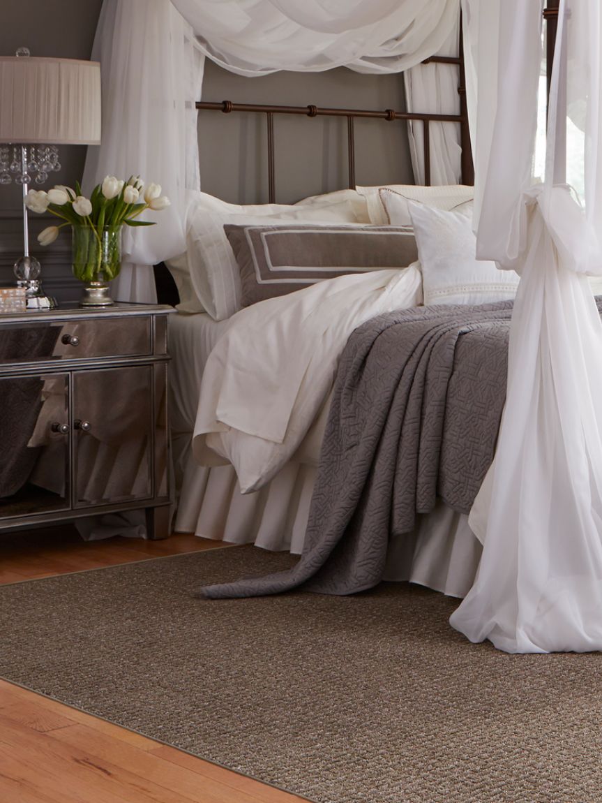 kids playing on newly installed Carpet One vinyl flooring in playroom